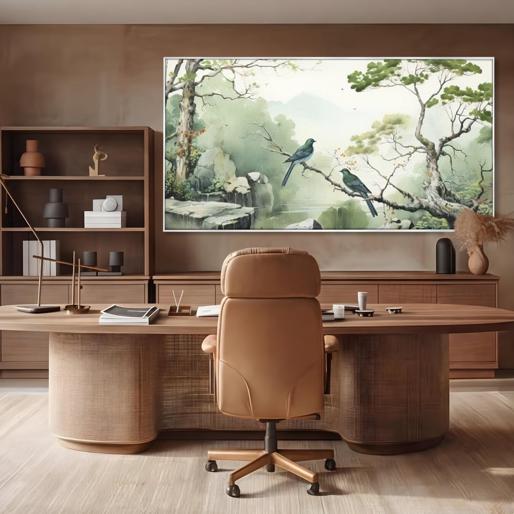 Tablou canvas cu tablou canvas cu pasari pe creanga si peisaj zen, in rama de aluminiu argintiu, pe perete intr-un birou